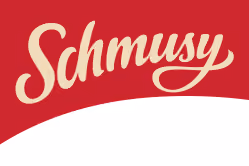 Wordmark 'Schmusy' in cream script on a red background.